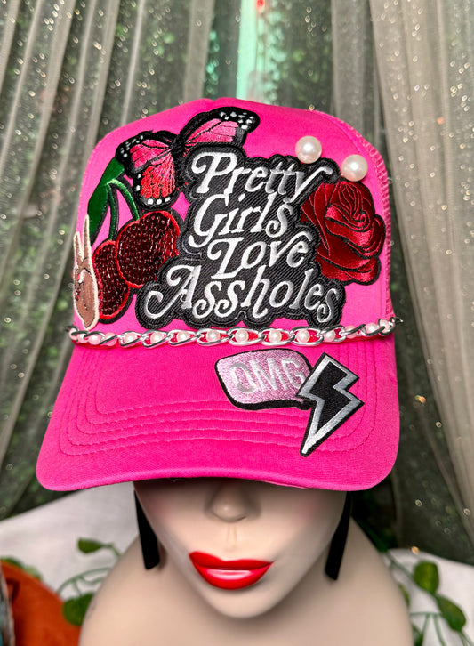 Pretty Girls Love Assholes Trucker Hat